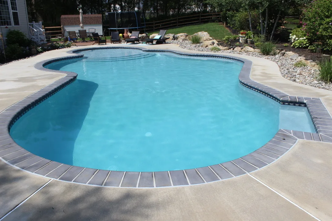 Inground pool with spa in Macungie, PA by Scott Payne Custom Pools