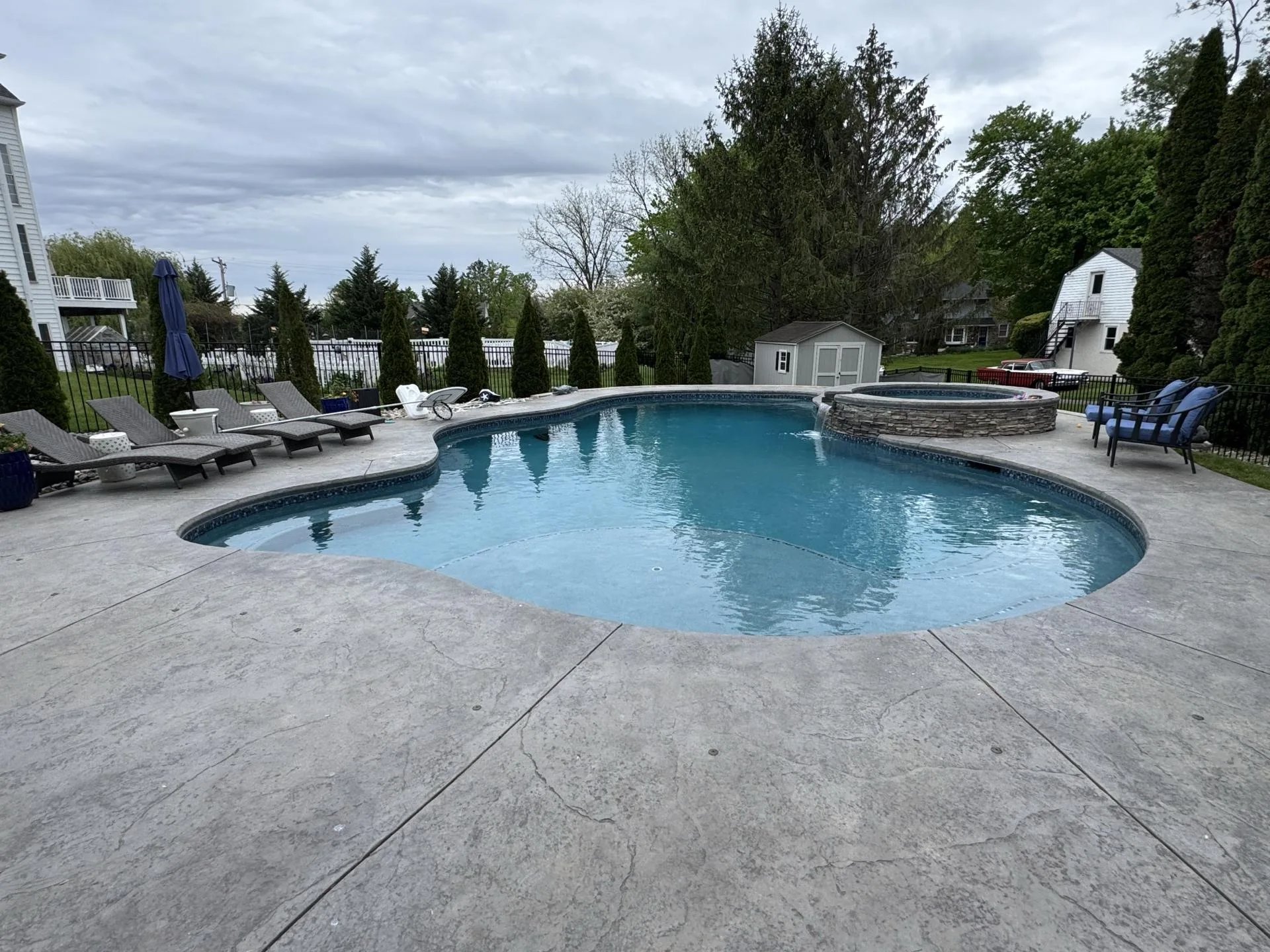 Inground pool with spa in West Chester, PA by Scott Payne Custom Pools