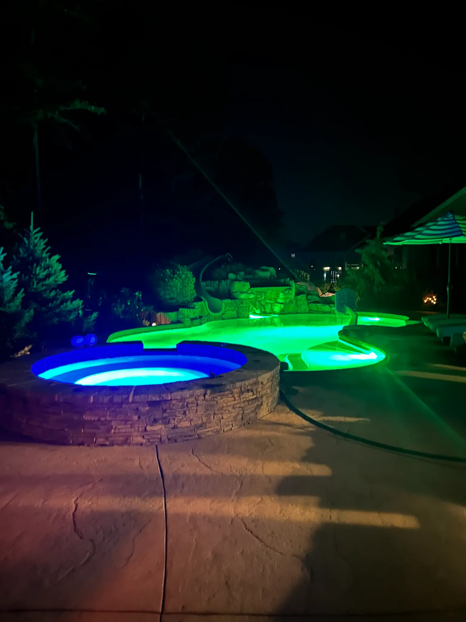 Joe J.'s pool — night lights