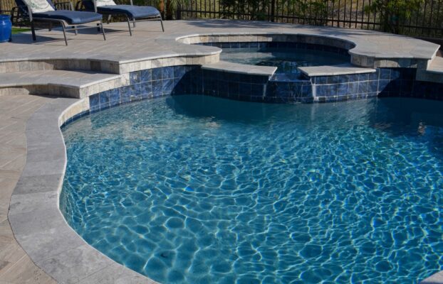 How Can I Ensure My Pool Design Complements My Outdoor Living Space?